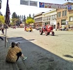 Lane Gwinn, publisher of The (Waitsburg) Times, takes photos during the annual Waitsburg Celebration Days parade.