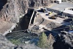 The outlet tunnel at the base of Iron Gate Dam is pictured in an undated photo. Water and debris will be removed from the three reservoirs upriver and will be channeled through the tunnel.