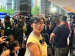 Selina Cheng, newly elected chairperson of the Hong Kong Journalists Association, speaks to media in Hong Kong on Wednesday. Cheng said she lost her job at The Wall Street Journal after she refused her supervisor’s request to withdraw from the election for the leadership post.