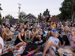 Spectators see the first sighting of Vaux's swifts for the evening at Chapman Elementary in Portland, Oregon on September 8, 2024.