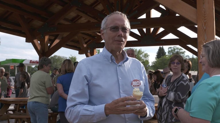 Judge Grasty enjoys a rally ice cream cone.