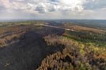 A burnt landscape caused by wildfires is pictured near Entrance, Wild Hay area, Alberta, Canada on May 10, 2023.