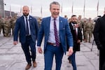 Defense Secretary Pete Hegseth leaves an oath of enlistment ceremony, Friday, Feb. 6, 2026, held on the base of the Washington Monument in Washington, D.C.