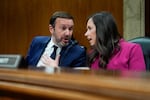 Sen. Katie Britt, R-Ala., right, speaks with Sen. Chris Murphy, D-Conn., during an oversight hearing on May 8, 2025. Britt and Murphy have been key negotiators for their parties in talks around DHS funding.