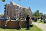 Florida State University students wait for news amid an active shooter incident at the school’s campus in Tallahassee, Fla., on Thursday.