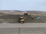 Crews work to stabilize movement of a landslide near I-84 milepost 359 near Ontario, Ore., March 31, 2023.