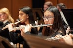 Oregon Episcopal School senior Macy Gong is pictured here on principal flute in the Portland Youth Philharmonic.