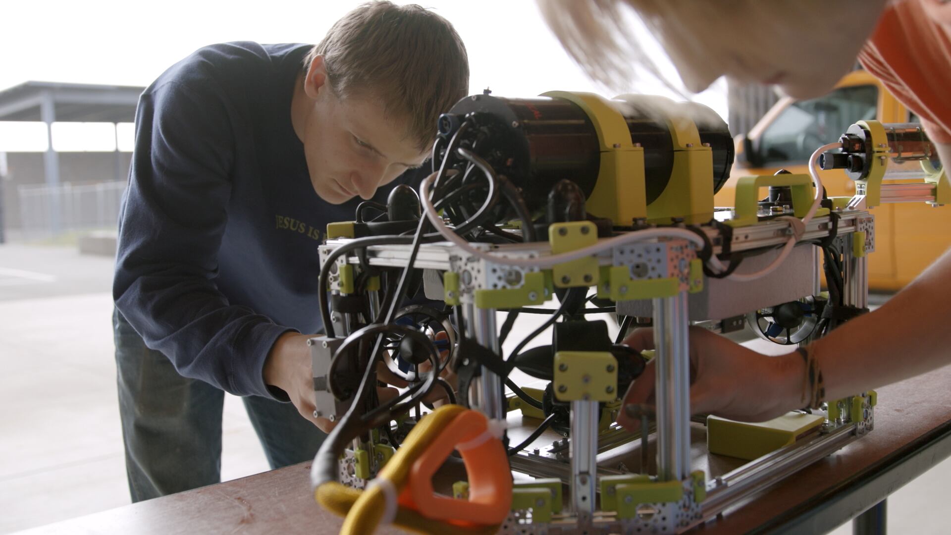 Dalton Wallace inspects ROV at Warrenton Middle School in Warrenton, Oregon, in March 2025.
