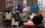 Yvonne Li, community health worker at Asian Health and Service Center, works at her desk on May 21, 2026 in Portland, Ore.