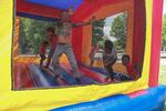 Children enjoy the inflatable bounce house at the 2016 Juneteenth Celebration at Legacy Emanuel Field.