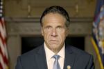 A close-up image of New York Governor Andrew Cuomo wearing a suit and looking at the camera.