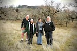 Siletz Tribal Council members, from left, Robert Kentta, treasurer; July Muschamp, secretary; Delores Pigsley, chairman; and Gerald Ben on the newly purchased Table Rock property in an undated photo.