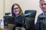 FILE: Portland City Council member Carmen Rubio, left, talks with fellow council members during a hearing at Portland City Hall, Jan. 25, 2023. 