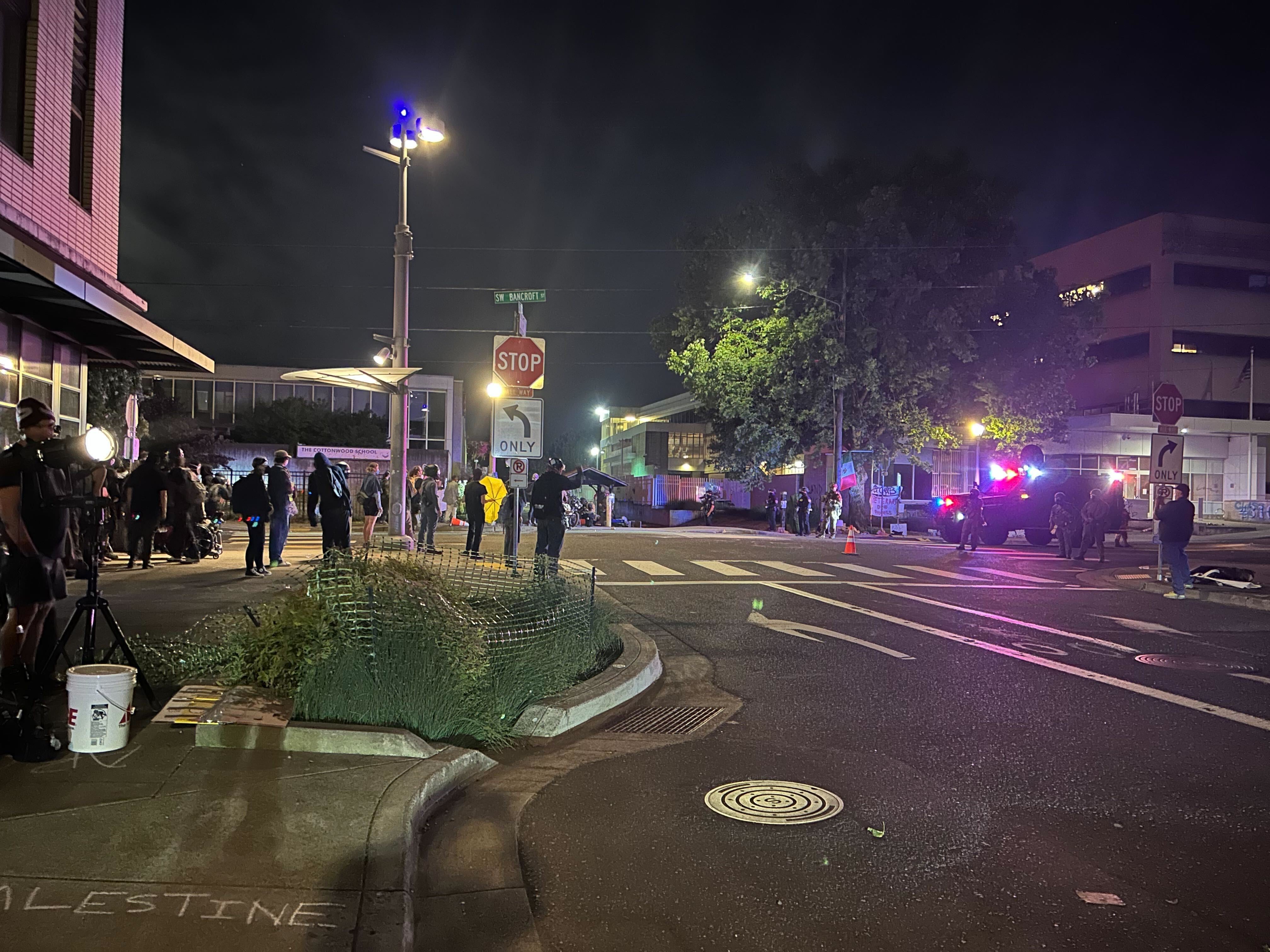 Dozens of protesters gathered outside the U.S. Immigration and Customs Enforcement office in Portland on June 10, 2025 and into the early hours the following morning, in opposition to the Trump administration’s immigration enforcement policies.
