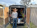 Grants Pass Housing Committee member Doug Walker with his trailer of tools.