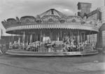 The Jantzen Beach carousel once sat outside as shown in this historic photo, but the ride later moved inside a shopping mall where it remained a popular attraction for years.