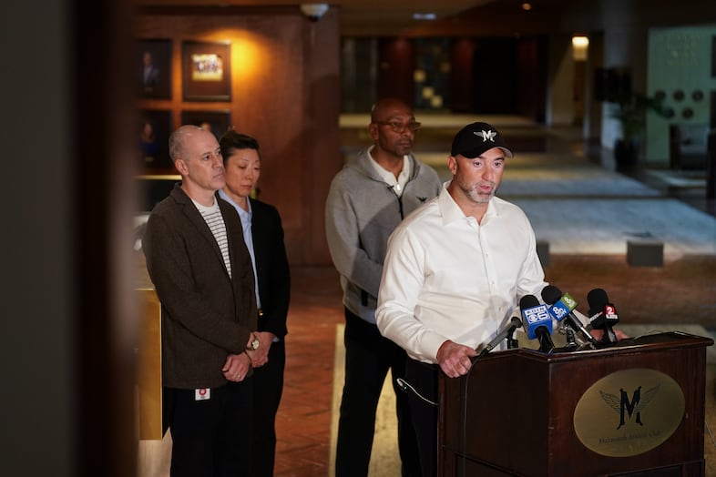 Multnomah Athletic Club general manager Charles Leverton speaks during a press conference as, from left, club communications director Bryan Bansbach, trustee Julie Kim and president Daniel Williams listen in the MAC hallway in Portland, Ore., on May 5, 2026. Disgruntled and mentally ill former food and beverage employee Bruce Valentine Whitman crashed a rental car carrying several pipe bombs into the MAC on May 2 and died during the incident. 