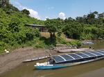 A solar boat at the village of Sharamentsa.