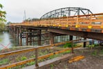 A temporary span runs parallel to the old Van Buren Bridge over the Willamette River in Corvallis, Ore., in this undated photo provided by the Oregon Department of Transportation. Drivers will be directed over the temporary bridge while construction of a new, permanent replacement for the Van Buren Bridge is underway.