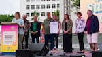 The family of Darcelle XV speak to the crowd at the grand opening.