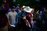 Following a talk by Turning Point USA founder Charlie Kirk, supporters clashed with University of Washington students and protesters who barricaded the east entrance to the encampment for Palestine on the Quad on Tuesday, May 7, 2024, in Seattle.