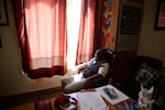 Asa Bynum spins around in the chair behind his mother's desk.