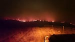 A ridgeline at night on fire.
