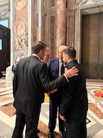 Ukraine's President Volodymyr Zelenskyy, right, President  Trump, second right, French President Emmanuel Macron, left, and British Prime Minister Keir Starmer talk as they attend the funeral of Pope Francis.