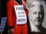 A supporter of Julian Assange protests in front of Westminster Magistrates Court in London, while calling for his release from Belmarsh Prison, on April 14.