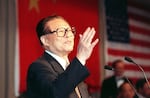 Chinese President Jiang Zemin sings a selection from "Beijing Opera" on the last day of an eight-day visit to the U.S. on Nov. 2, 1997, in Los Angeles.