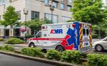 An ambulance drives through Vancouver, Wash., Aug. 25, 2020.