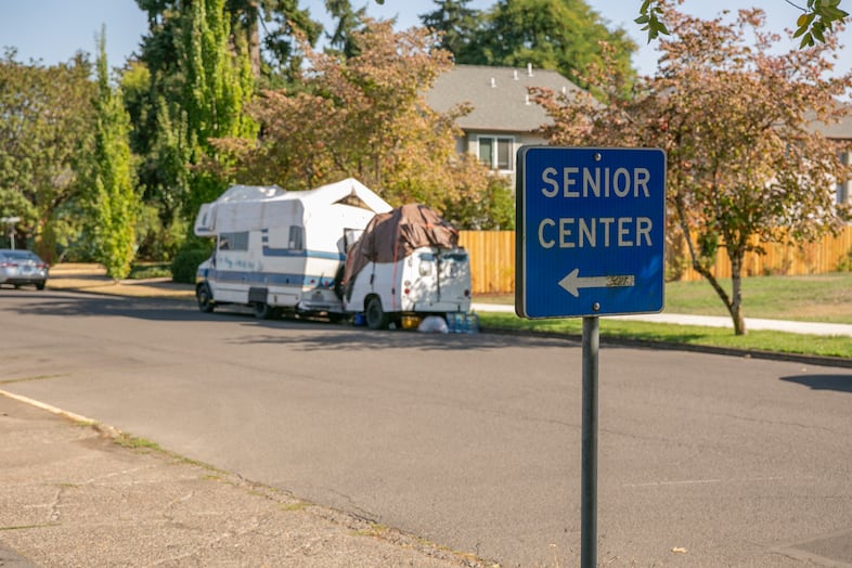 A sign points to the entrance of the Senior Community Center in Monmouth. About one in four homeless people in the state — more than 4,600 people — were over the age of 55 in 2024.