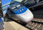 FILE - An Amtrak Acela Express passenger train pulls into the station on Wednesday, Dec. 5, 2018, in Westwood, Mass. Backers of a Cascadia bullet train envision even higher speeds in the Pacific Northwest.