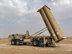 A Terminal High Altitude Area Defense (THAAD) launcher emplaced and prepared to launch interceptors to counter ballistic missile threats at an undisclosed location in CENTCOM area of responsibility in November 2023.