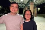 Wei Kang Ding and Judy Zhu outside of a candidate debate hosted by high school students on Sept. 28. in Johns Creek, Ga. Ding and Zhu say they are still doing their election research.