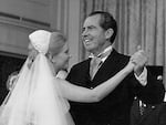 President Richard Nixon dances with his daughter, Tricia, during her wedding reception on June 12, 1971 at the White House.
