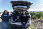 Yvonne Segovia, left, who works for the Blue Mountain Action Council’s food bank, and Itzel Cuevas Vásquez, a “promotora de salud” for Vital Wines, pose before giving a presentation to vineyard workers.