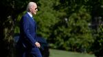 President Joe Biden walks across the South Lawn of the White House in Washington on April 21, 2023, as he heads to Marine One to travel to Camp David for the weekend.
