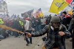 Trump supporters clash with police and security forces as people try to storm the U.S. Capitol Building in Washington, D.C., on January 6, 2021.