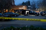 FILE - FBI investigators work on the scene where two people were shot and wounded Thursday, Jan. 8, 2026, by U.S. Border Patrol earlier that day.