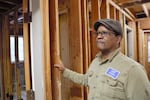 Stuart Wells, the executive director of the group formerly known as Portland Audubon, takes a look at construction at the nonprofit's animal hospital on March 1, 2023. It was extensively damaged in a flood this winter.