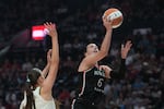 FILE - Portland Fire forward Bridget Carleton (6) goes to the basket during the first half of a WNBA basketball game against the Chicago Sky, May 9, 2026, in Portland, Ore.
