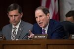 Senate Intelligence Committee member Sen. Ron Wyden, D-Ore., right, with Sen. Martin Heinrich, D-N.M., questions Attorney General Jeff Sessions on Capitol Hill in Washington, Tuesday, June 13, 2017.