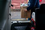 Shirley drops off food and home staple items for people in hiding due to U.S. Immigration and Customs Enforcement raids in Hillsboro, Ore., on Dec. 5, 2025. Most of the goods they distribute are donations or bought with donation funds the group gathered.