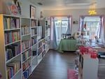 This photo taken on Nov. 19, 2023, shows the interior of The Romance Era Bookshop. The Vancouver store carries only books written in the romance genre, and is designed to evoke the feeling of being in a friend's house than a traditional retail space, according to owner Ren Rice.