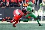 Oregon wide receiver Troy Franklin, right, is brought down by Oregon State defensive back Kitan Oladapo during their football game on Nov 26, 2022, in Corvallis, Ore. The Ducks and Beavers are likely to keep playing annual games, even as they compete in different athletic conferences starting in 2024.