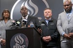 Portland Public Schools Board of Education Chair Gary Hollands, second from left, speaks at a press conference at the PPS district headquarters in Portland, Ore., Nov. 1, 2023.