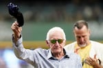 Milwaukee Brewers radio announcer Bob Uecker tips his cap before a baseball game between the Brewers and the Miami Marlins on July 28, 2024, in Milwaukee.