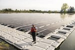 Floating solar panels are seen on an irrigation reservoir in Central Point in an undated provided image.