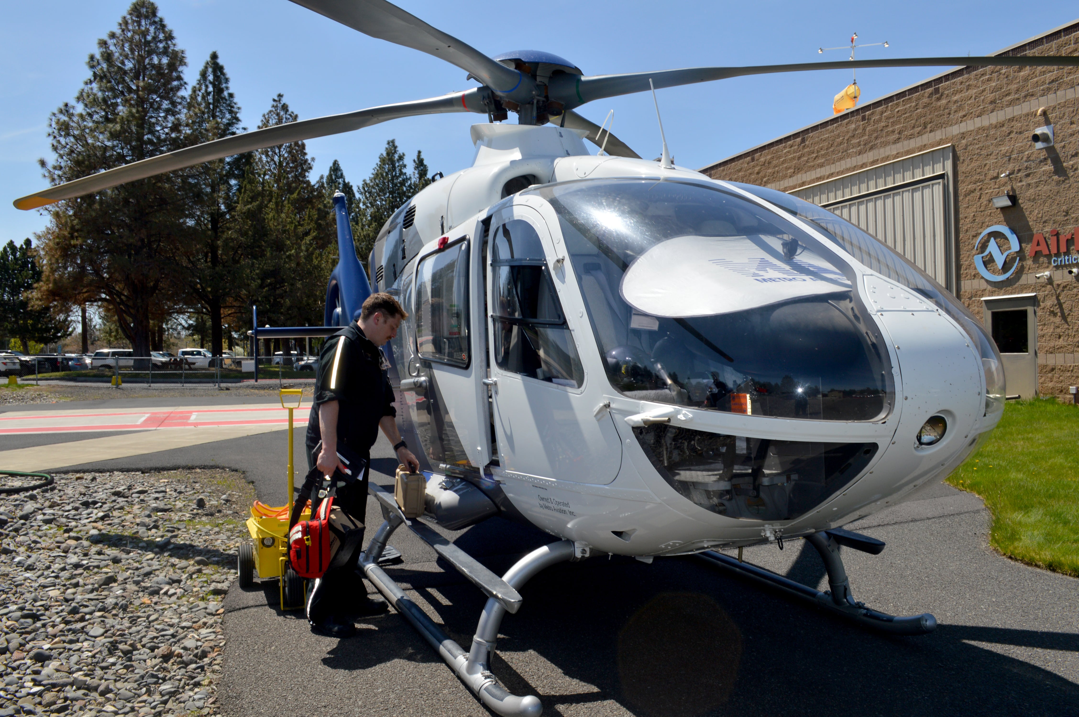 Paul Pearlmutter, a flight respiratory therapist with AirLink, prepares the air ambulance in Bend on May 30, 2025.